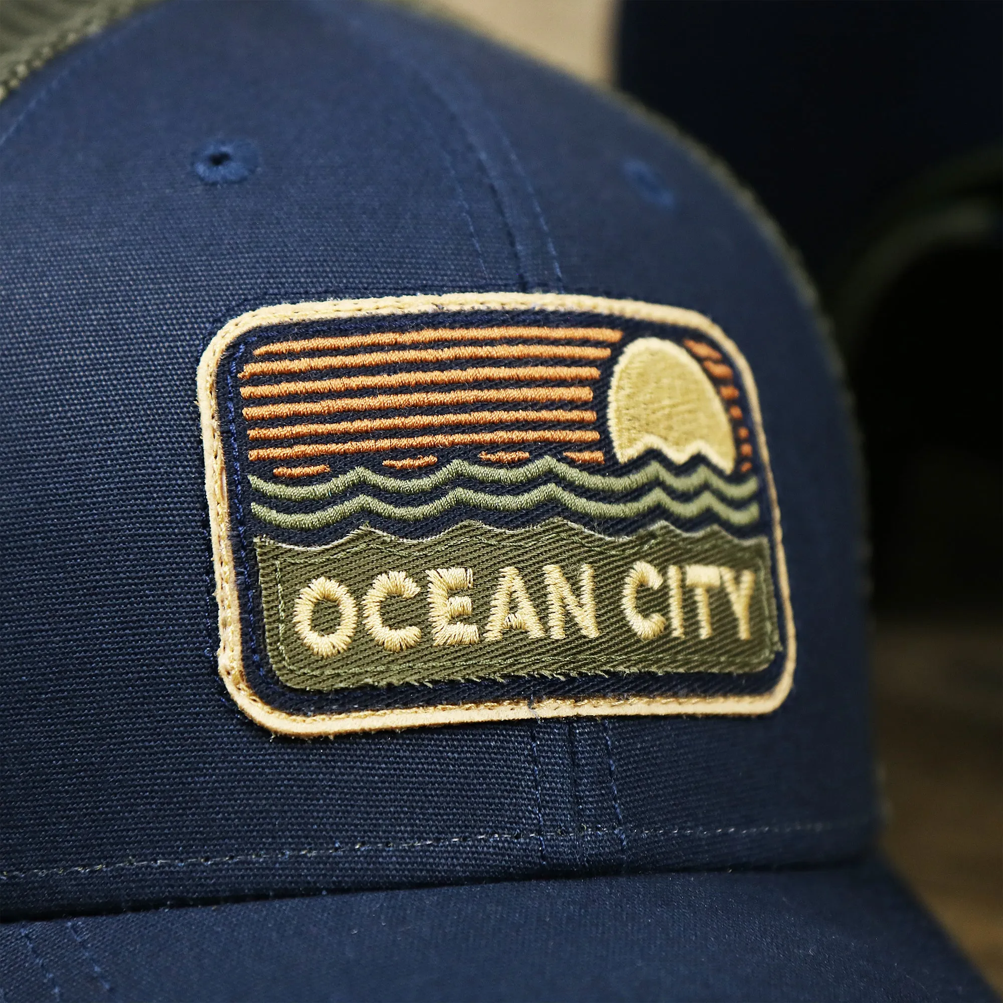 New Jersey Ocean City Sunset Mesh Back Trucker Hat | Navy Blue And Olive Mesh Trucker Hat